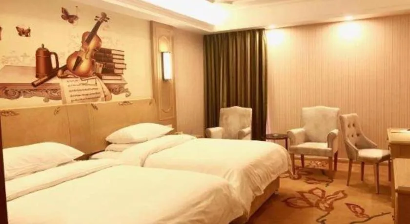 Bed in Vienna Hotel Chengdu Chadianzi Toursim Center