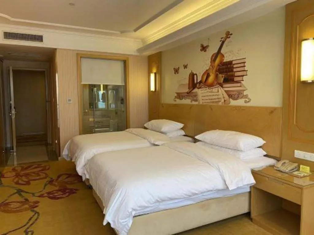 Bed in Vienna Hotel Chengdu Chadianzi Toursim Center