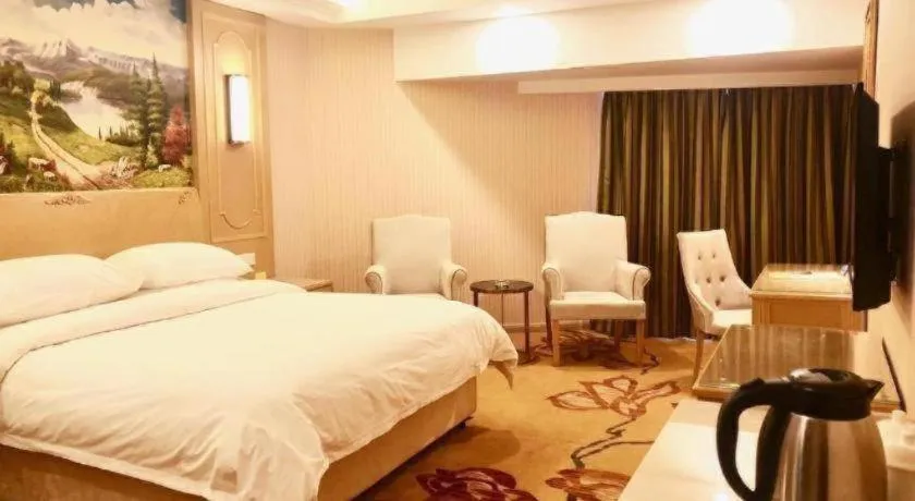 Bed in Vienna Hotel Chengdu Chadianzi Toursim Center