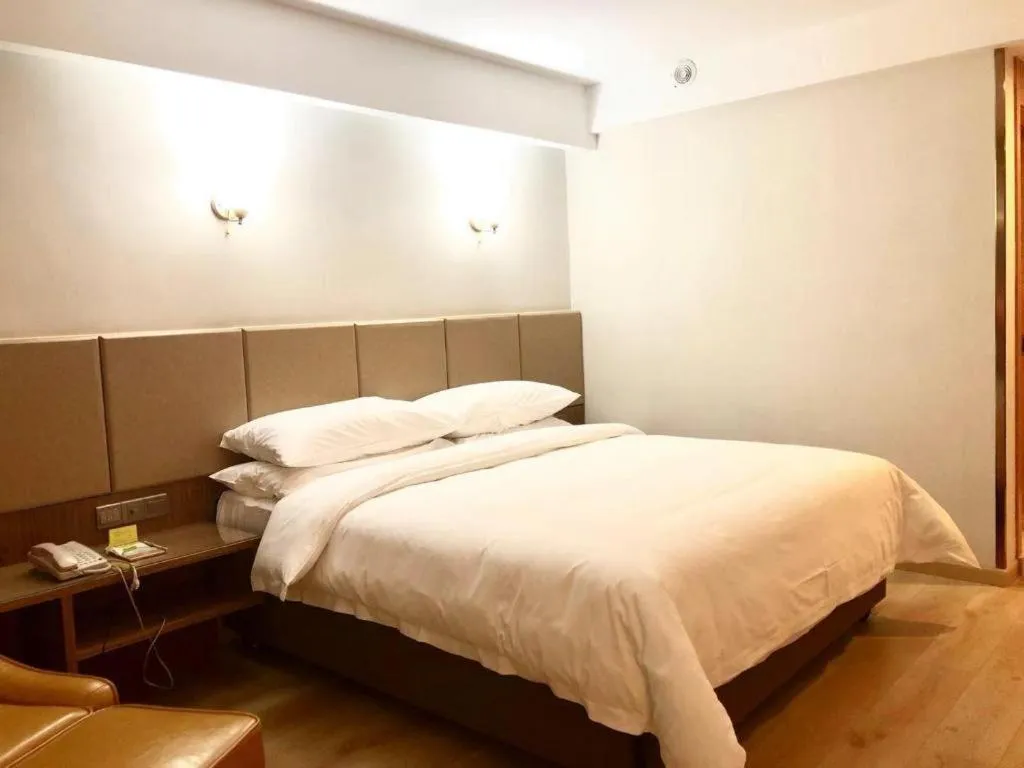 Bed in Vienna Hotel Chengdu Chadianzi Toursim Center