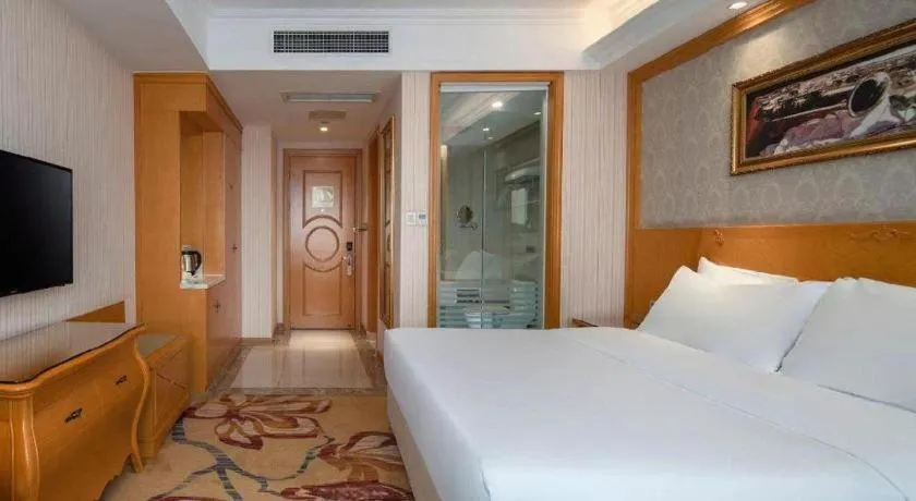 Bed in Vienna Hotel Chengdu Chadianzi Toursim Center