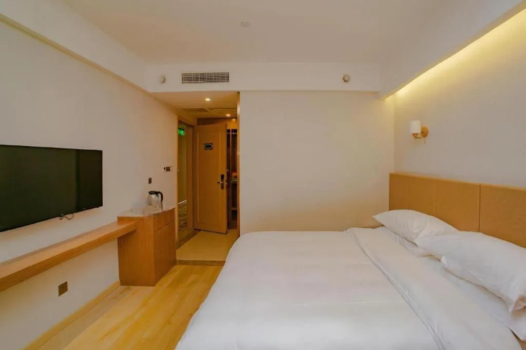 Bed in Vienna Hotel Chengdu Chadianzi Toursim Center