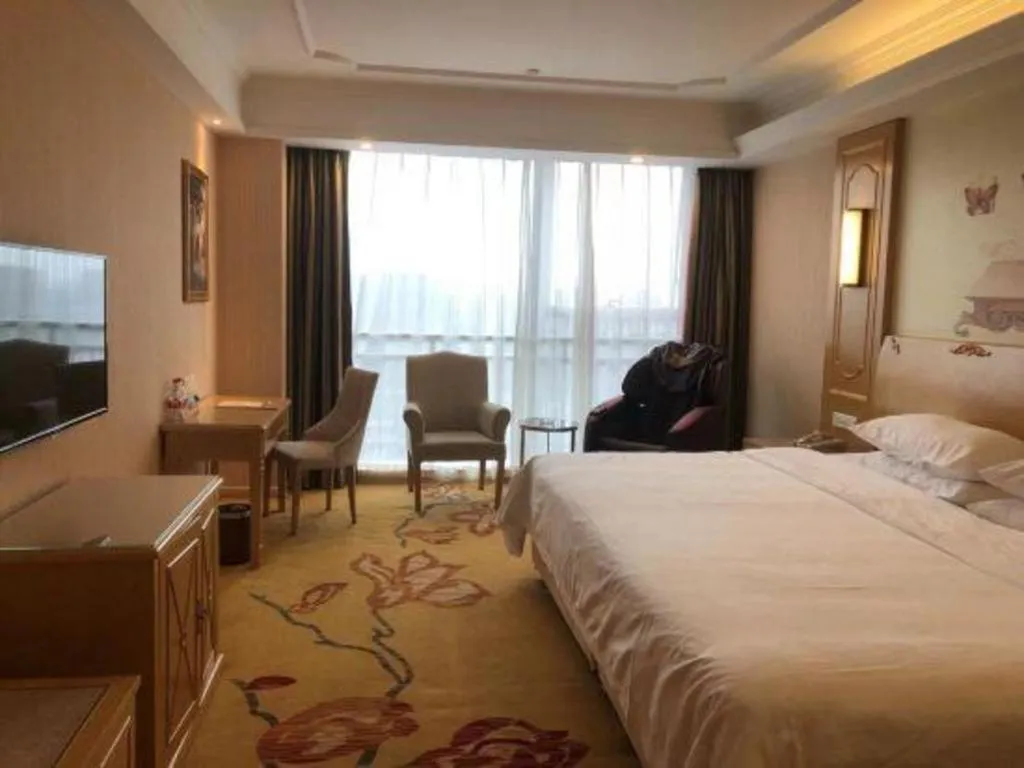 Bed in Vienna Hotel Chengdu Chadianzi Toursim Center