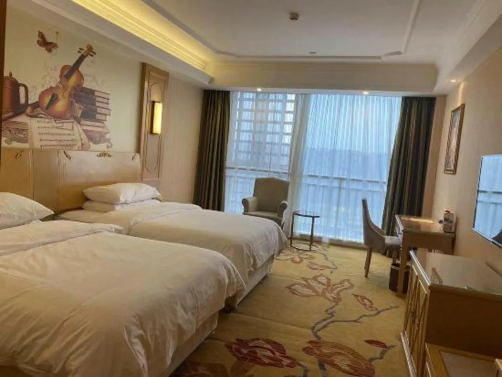 Bed in Vienna Hotel Chengdu Chadianzi Toursim Center