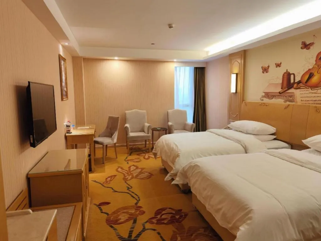 Bed in Vienna Hotel Chengdu Chadianzi Toursim Center