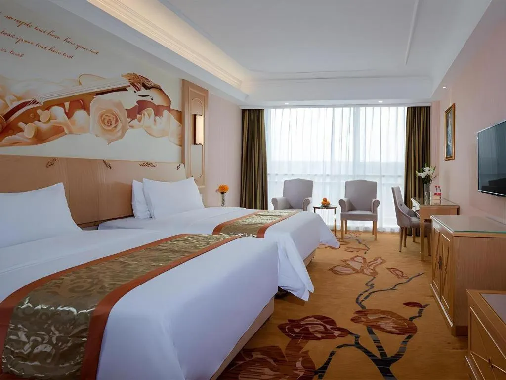 Bed in Vienna Hotel Chengdu Chadianzi Toursim Center