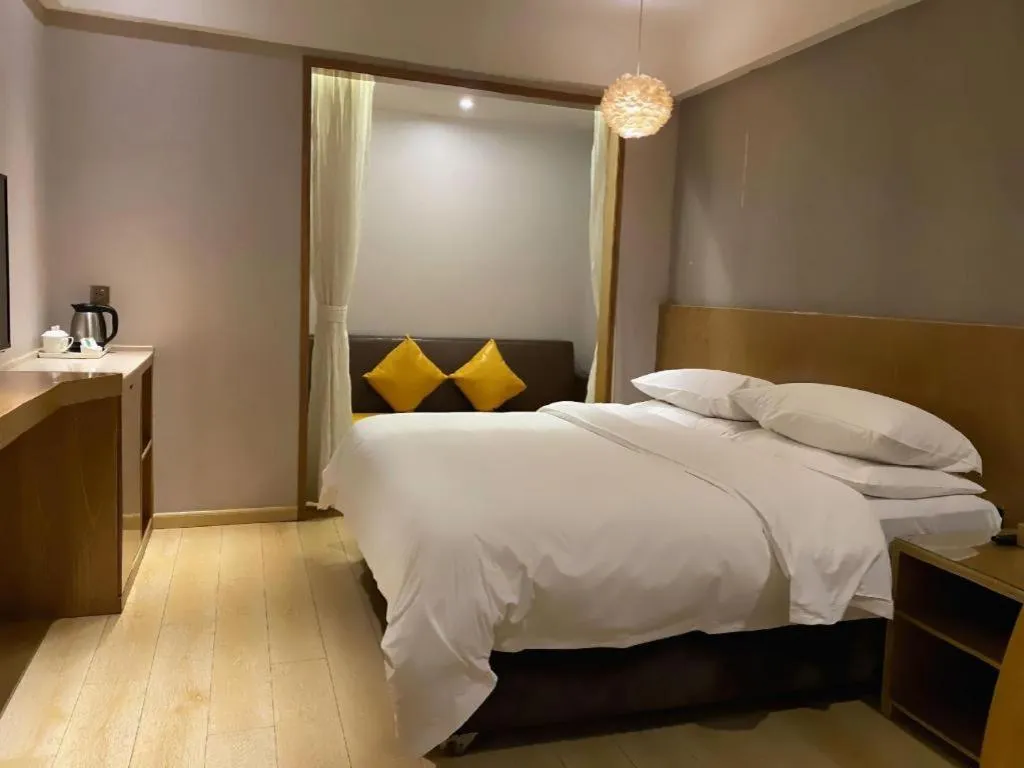 Bed in Vienna Hotel Chengdu Chadianzi Toursim Center