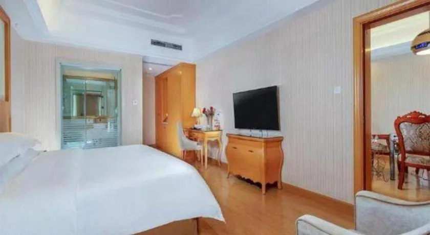 Bed in Vienna Hotel Chengdu Chadianzi Toursim Center