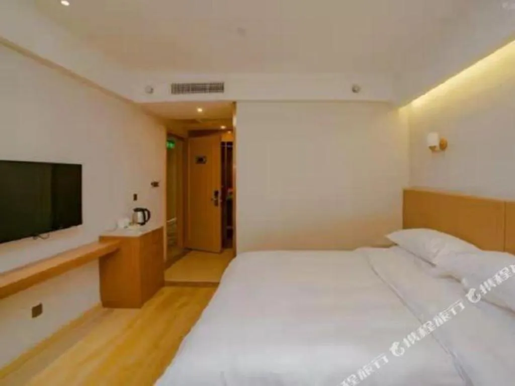 Bed in Vienna Hotel Chengdu Chadianzi Toursim Center