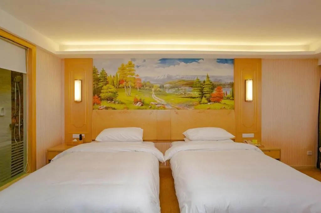 Bed in Vienna Hotel Chengdu Chadianzi Toursim Center