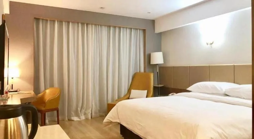 Bed in Vienna Hotel Chengdu Chadianzi Toursim Center