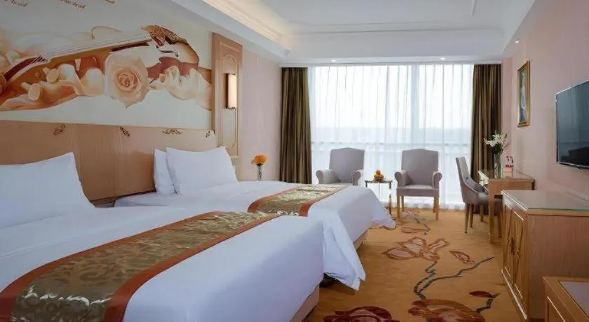 Bed in Vienna Hotel Chengdu Chadianzi Toursim Center