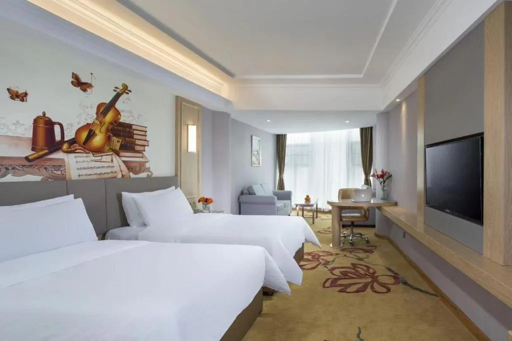 Bed in Vienna Hotel Shandong Linyi Mengyin