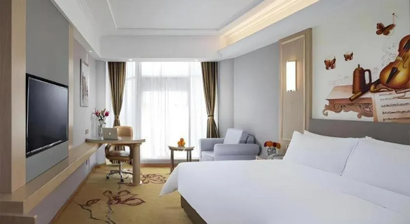 Bed in Vienna Hotel Shandong Linyi Mengyin