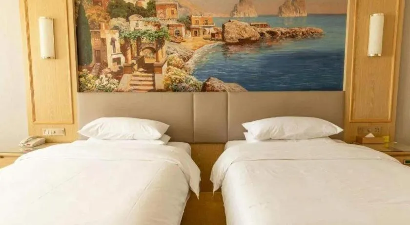 Bed in Vienna Hotel Shandong Linyi Mengyin