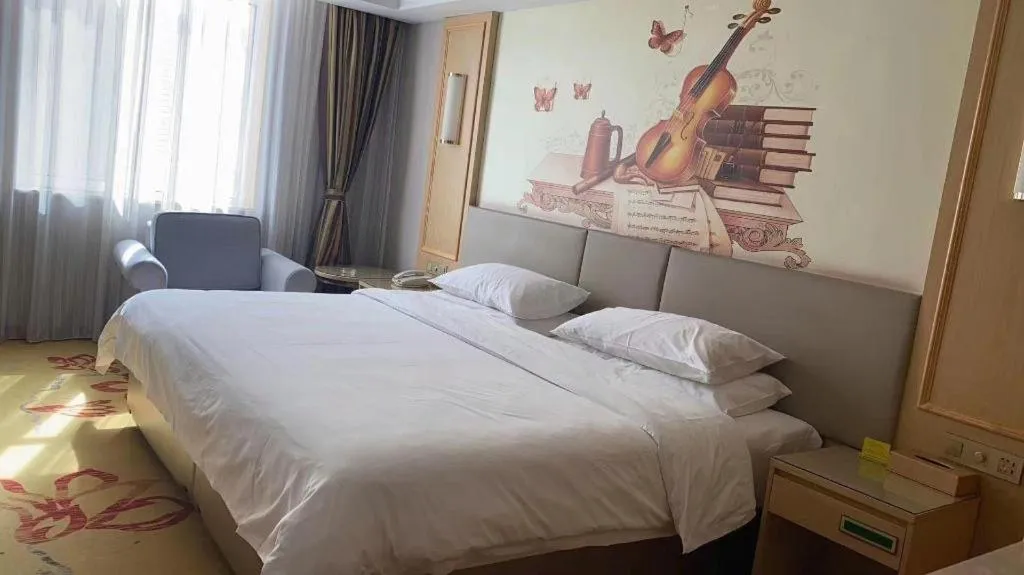 Bed in Vienna Hotel Shandong Linyi Mengyin