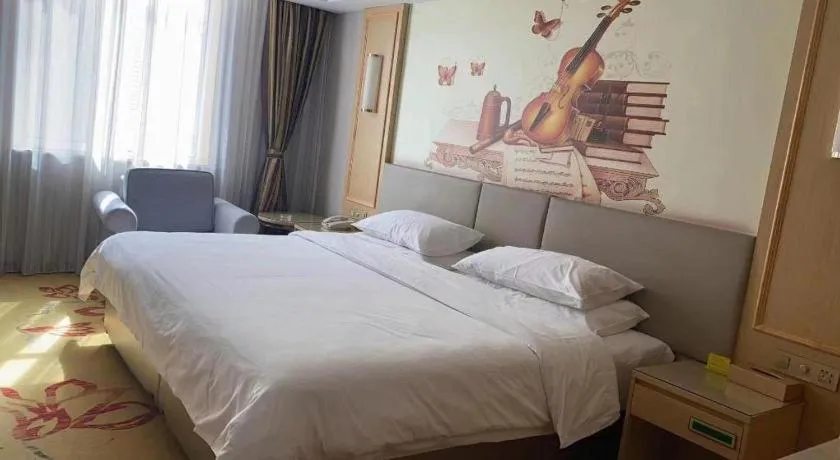 Bed in Vienna Hotel Shandong Linyi Mengyin