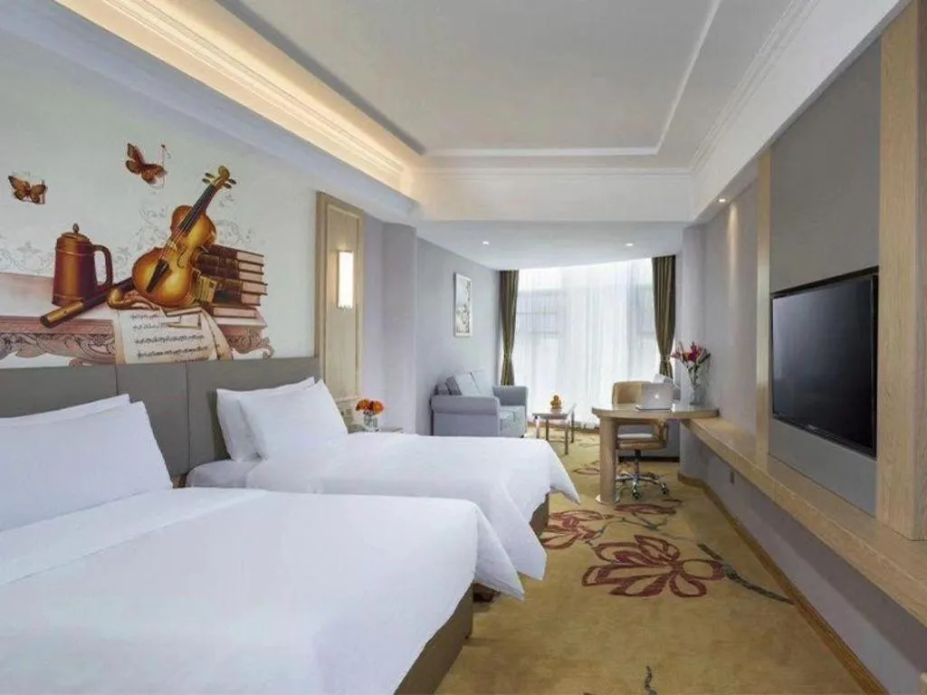Bed in Vienna Hotel Shandong Linyi Mengyin