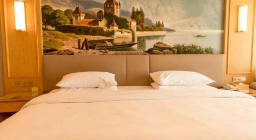 Bed in Vienna Hotel Shandong Linyi Mengyin