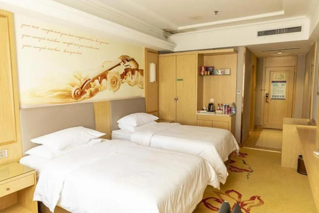 Bed in Vienna Hotel Shandong Linyi Mengyin