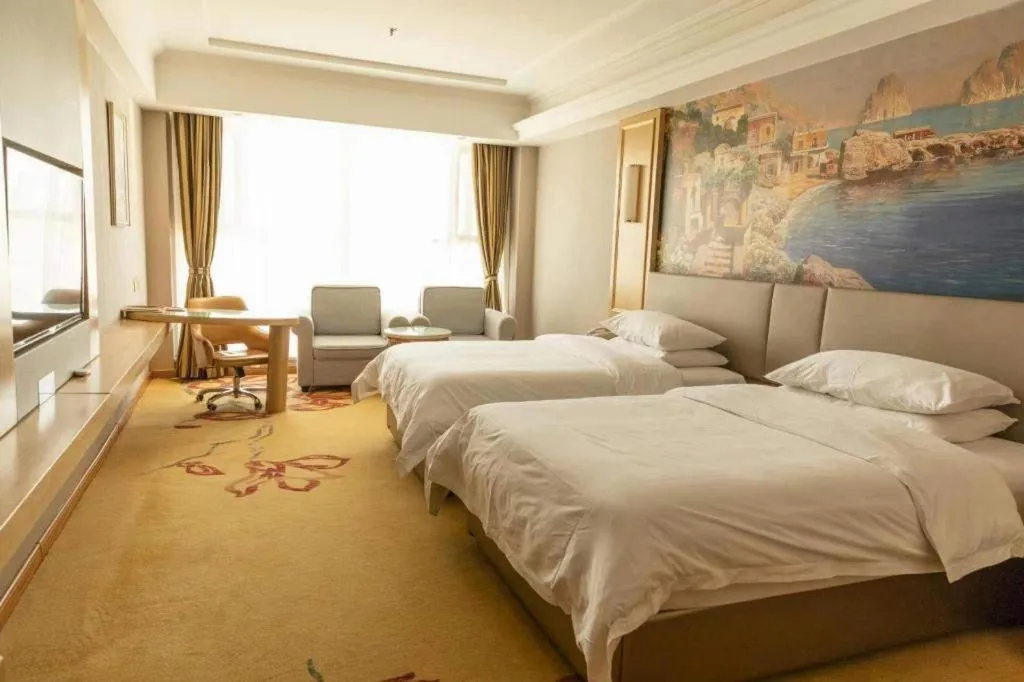 Bed in Vienna Hotel Shandong Linyi Mengyin