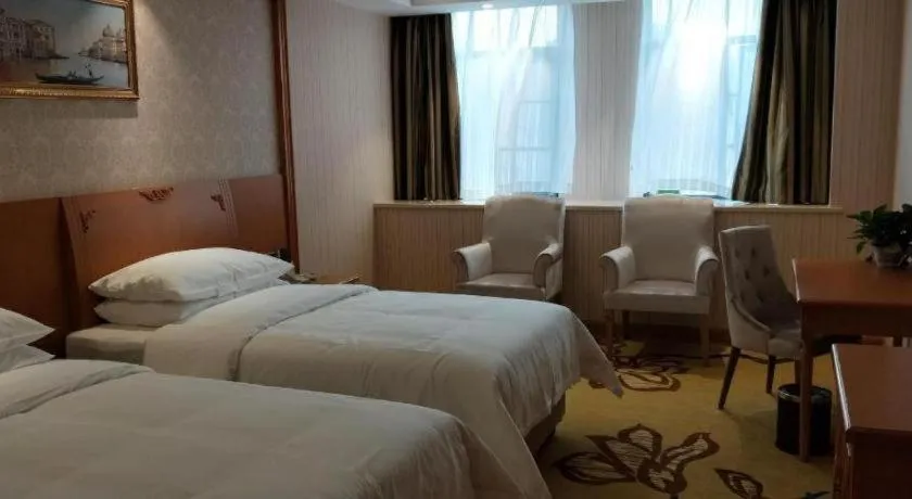 Bed in Vienna Hotel Hubei Enshi Railway Station