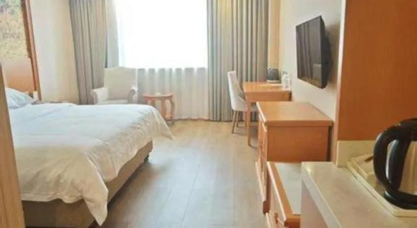 Bed in Vienna Hotel Hubei Enshi Railway Station