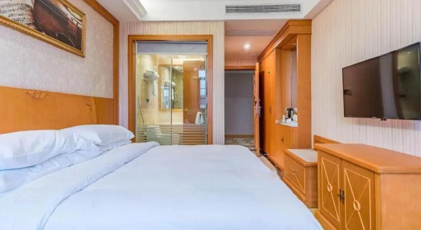 Bed in Vienna Hotel Hubei Enshi Railway Station