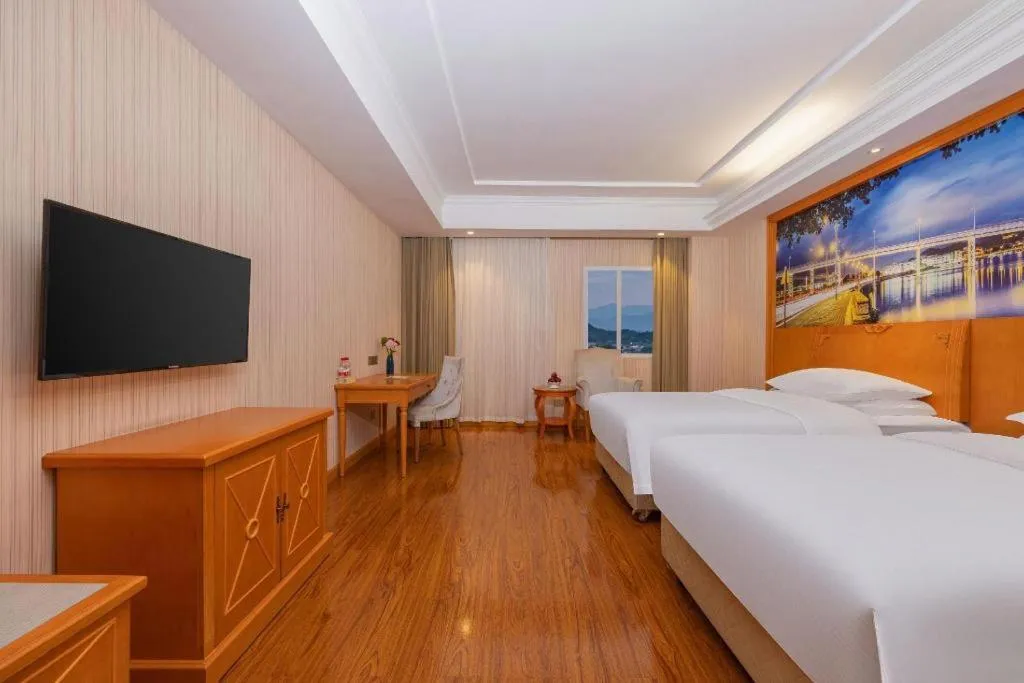 Bed in Vienna Hotel Hubei Enshi Railway Station