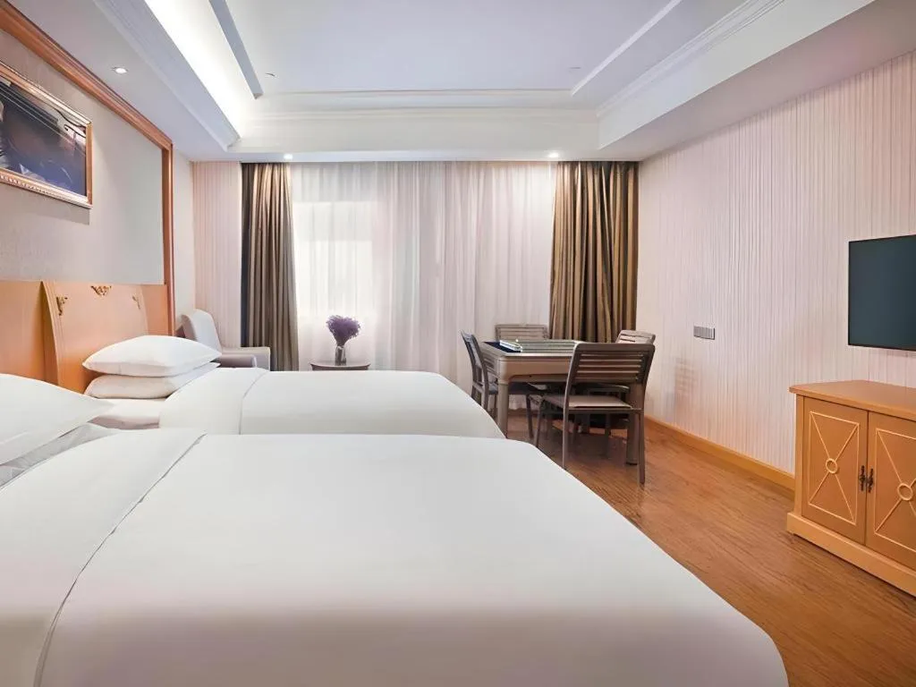 Bed in Vienna Hotel Hubei Enshi Railway Station