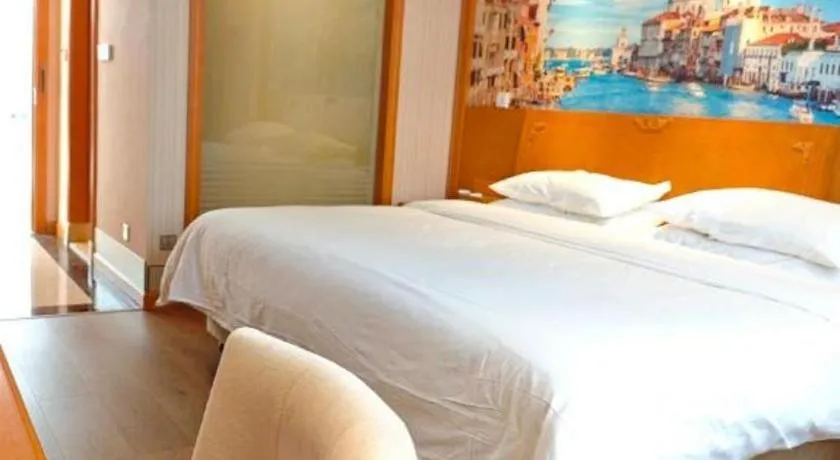 Bed in Vienna Hotel Hubei Enshi Railway Station