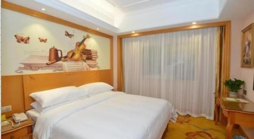 Bed in Vienna Hotel Shanghai Songjiang Market Miaoqian Street