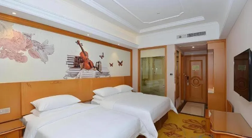 Bed in Vienna Hotel Shanghai Songjiang Market Miaoqian Street