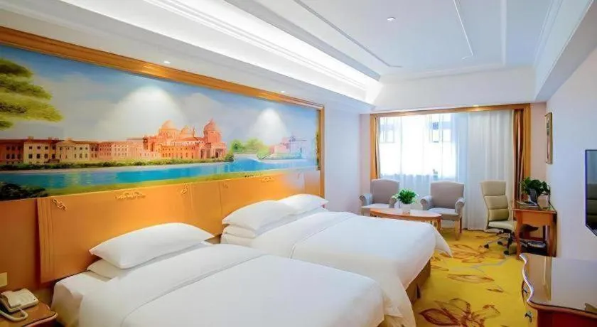 Bed in Vienna Hotel Shanghai Songjiang Market Miaoqian Street