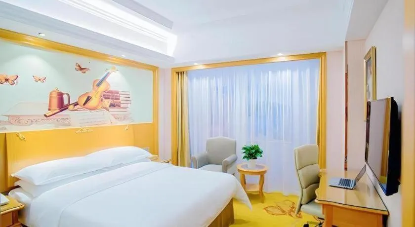 Bed in Vienna Hotel Shanghai Songjiang Market Miaoqian Street