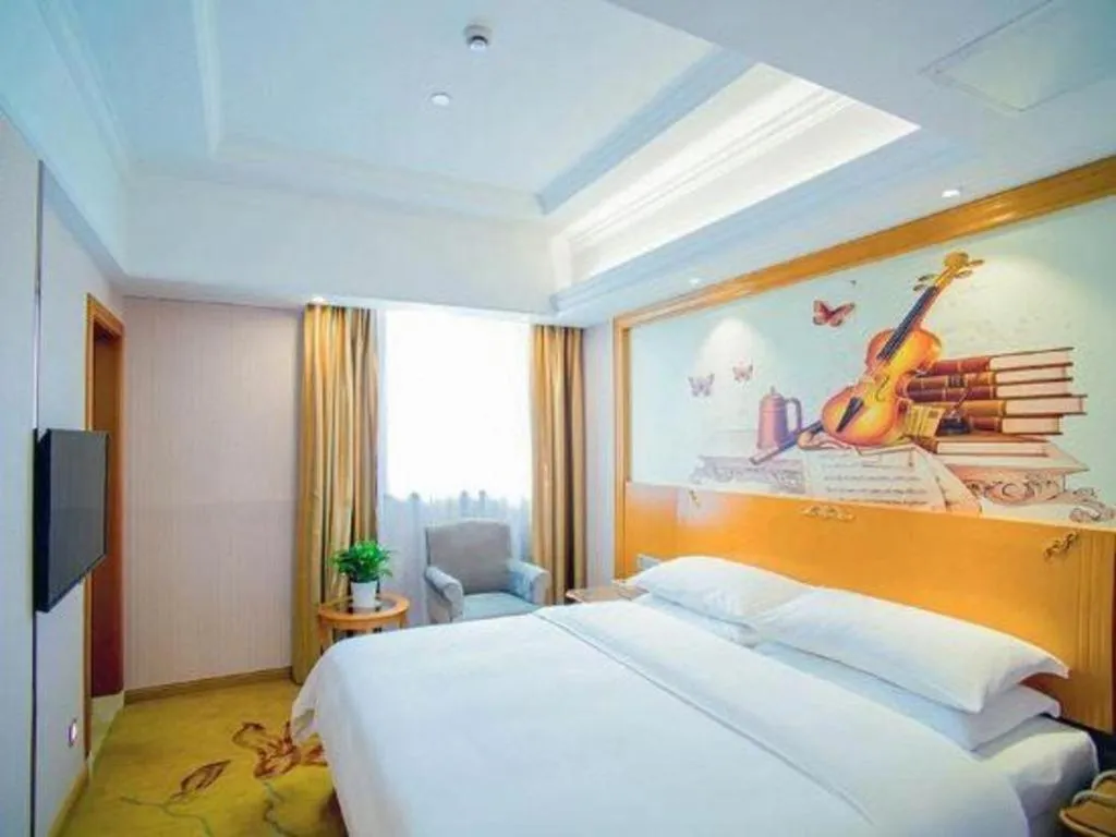 Bed in Vienna Hotel Shanghai Songjiang Market Miaoqian Street