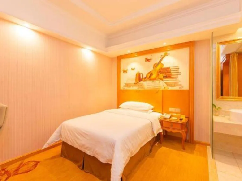 Bed in Vienna Hotel Shanghai Songjiang Market Miaoqian Street