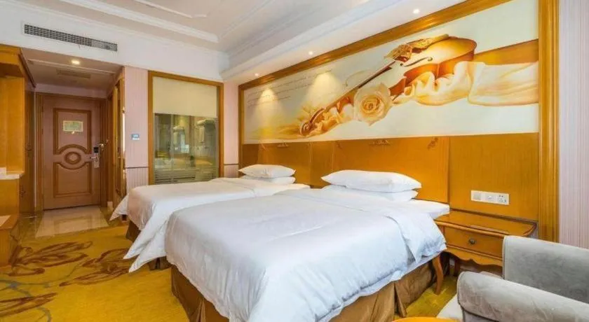 Bed in Vienna Hotel Shanghai Songjiang Market Miaoqian Street