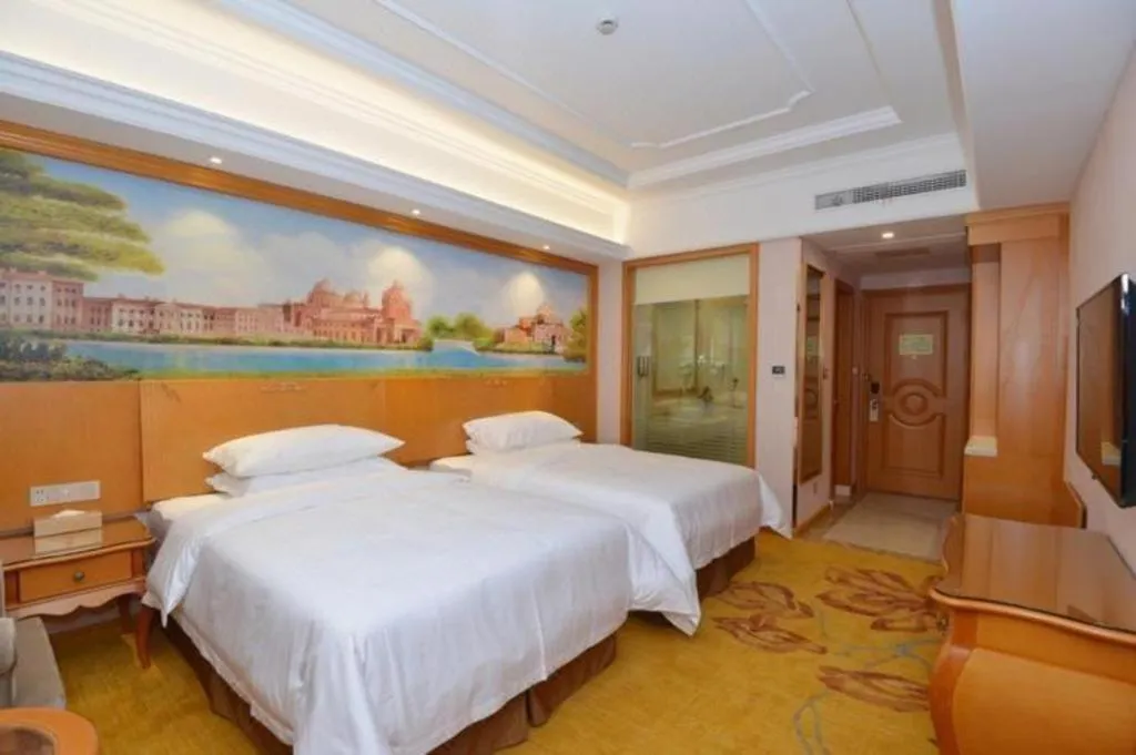 Bed in Vienna Hotel Shanghai Songjiang Market Miaoqian Street