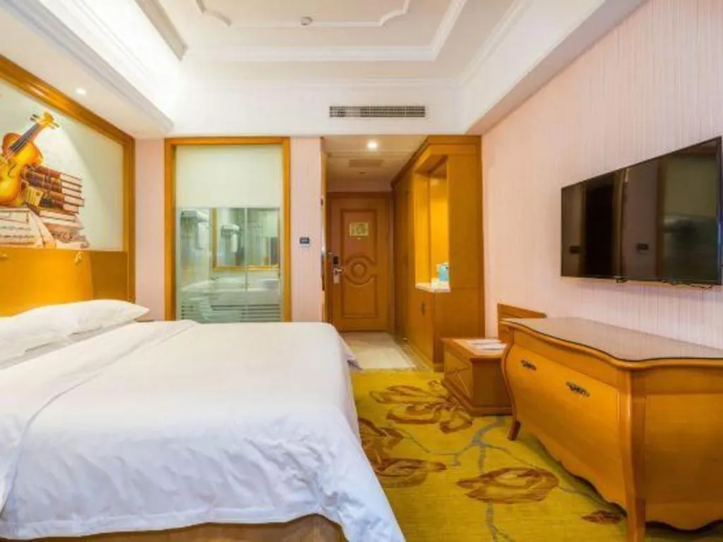 Bed in Vienna Hotel Shanghai Songjiang Market Miaoqian Street