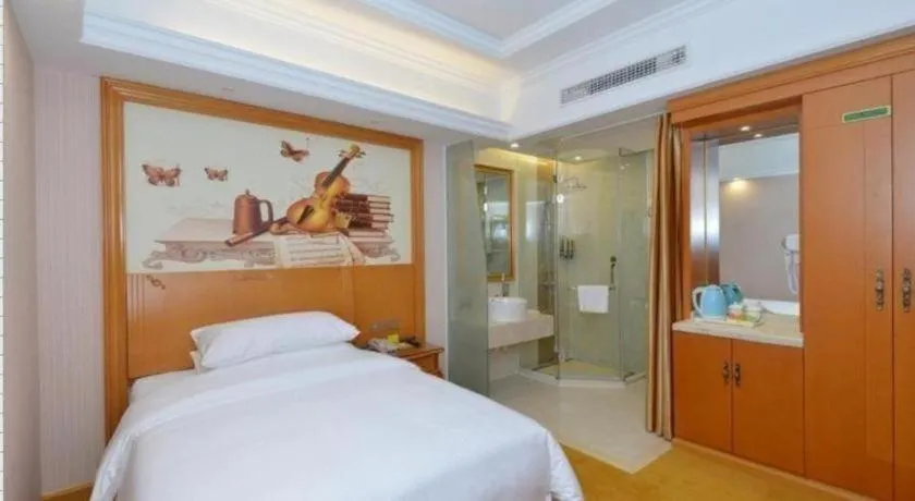 Bed in Vienna Hotel Shanghai Songjiang Market Miaoqian Street