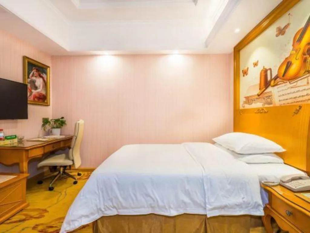 Bed in Vienna Hotel Shanghai Songjiang Market Miaoqian Street