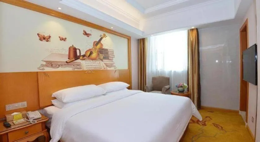 Bed in Vienna Hotel Shanghai Songjiang Market Miaoqian Street