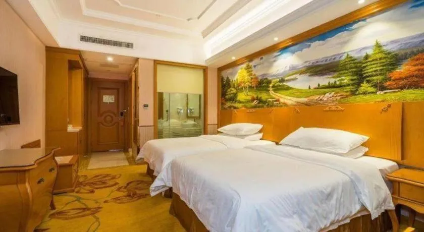 Bed in Vienna Hotel Shanghai Songjiang Market Miaoqian Street