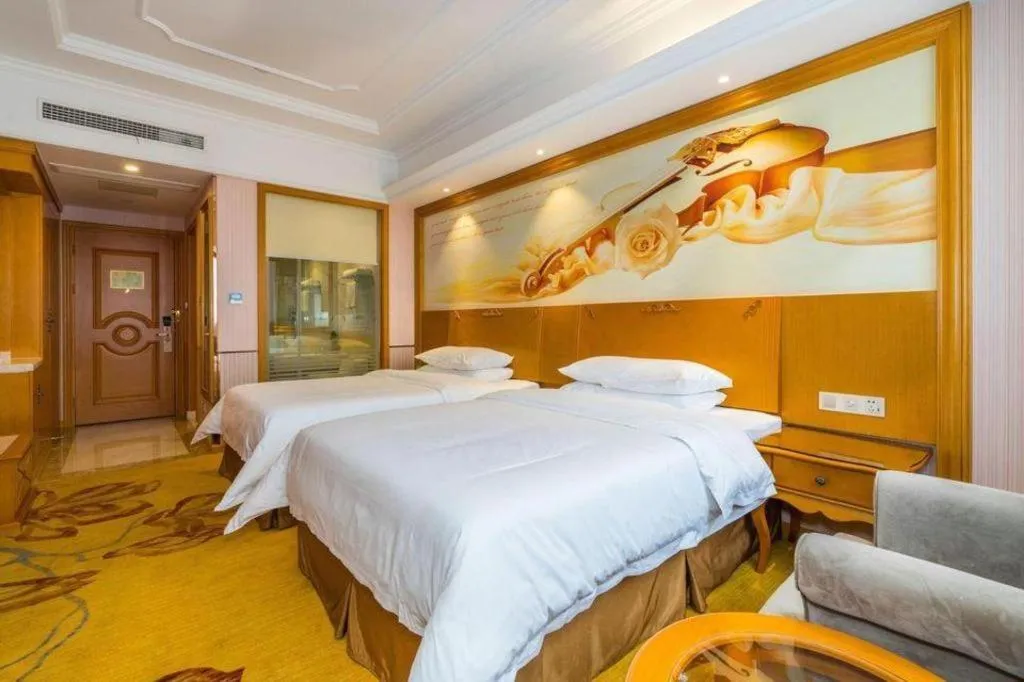 Bed in Vienna Hotel Shanghai Songjiang Market Miaoqian Street