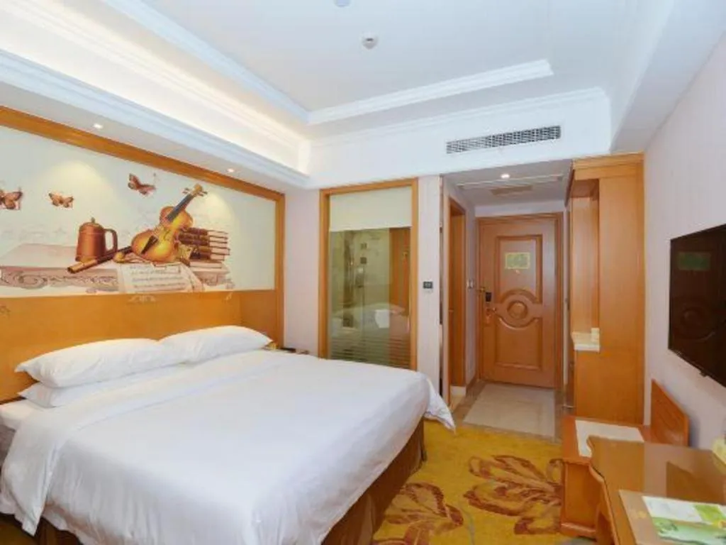 Bed in Vienna Hotel Shanghai Songjiang Market Miaoqian Street