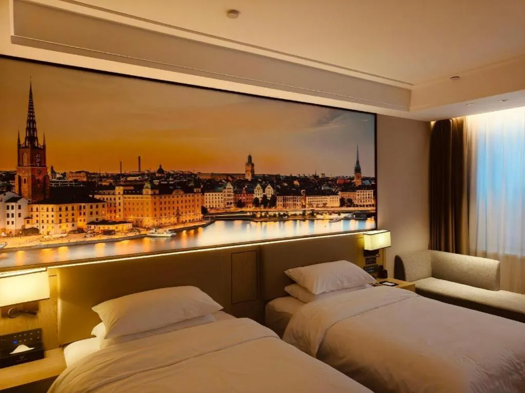 Bed in Vienna Hotel Shaanxi Xiianyang Yangling South Station