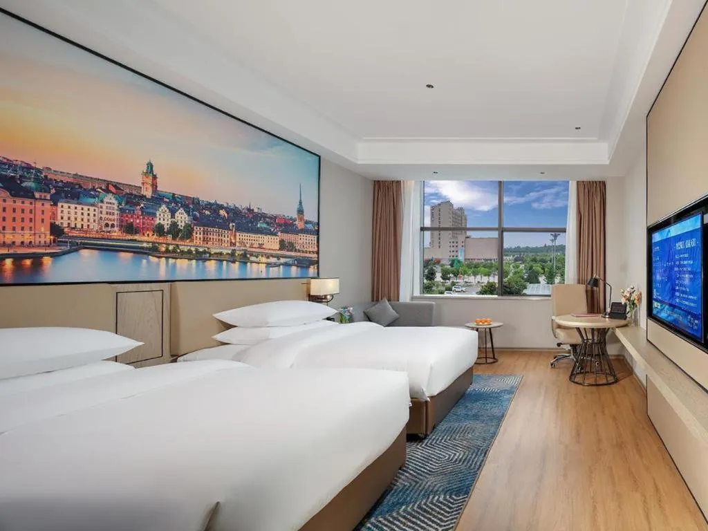 Bed in Vienna Hotel Shaanxi Xiianyang Yangling South Station
