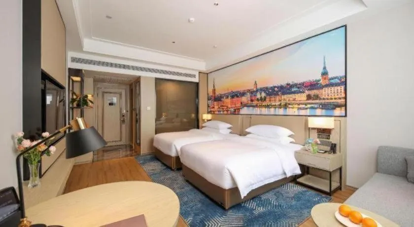 Bed in Vienna Hotel Shaanxi Xiianyang Yangling South Station
