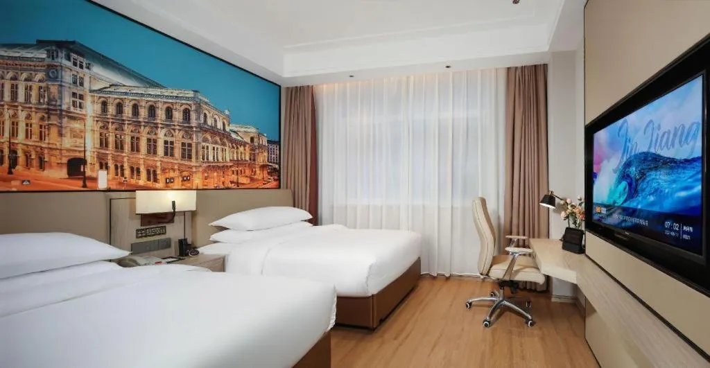 Bed in Vienna Hotel Shaanxi Xiianyang Yangling South Station